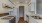 a kitchen with white cabinets