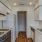 a kitchen with white cabinets