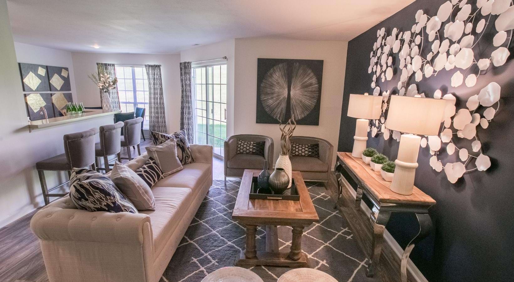 Wide open living areas perfect for entertaining a living room with a couch and a coffee table
