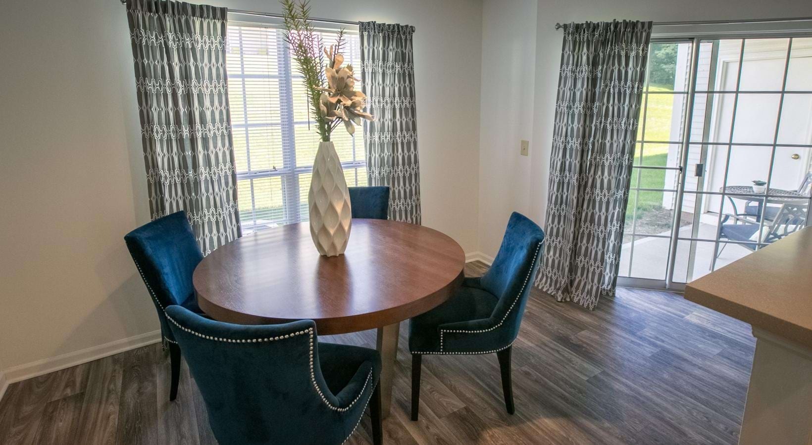 Beautiful living areas to match your lifestyle a dining room table with chairs