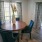 a dining room table with chairs
