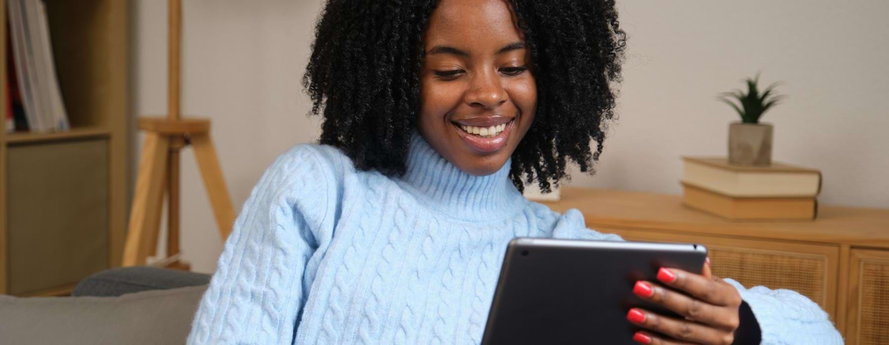 a person holding a tablet