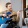 a person playing a guitar
