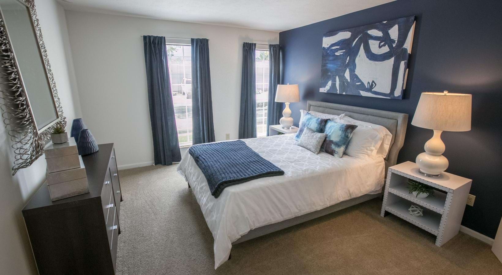 Sleep in style a bedroom with a bed and lamps