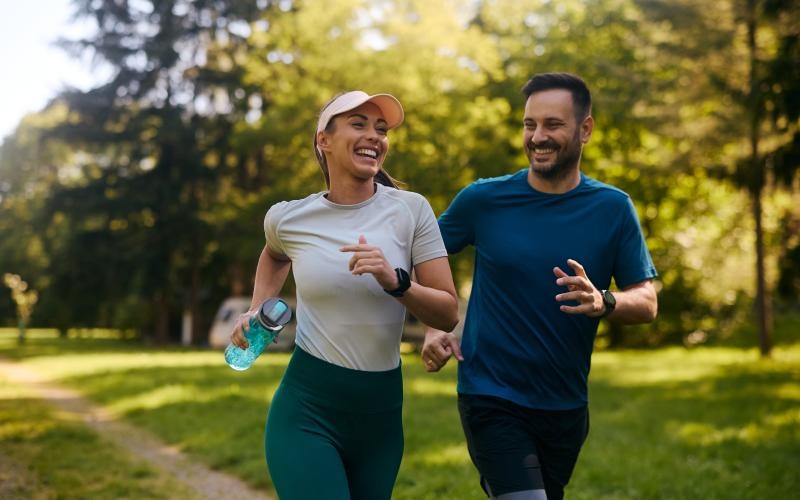 a man and woman running