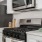a kitchen with a stove and microwave