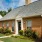 a brick house with a driveway