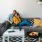a man and woman sitting on a couch