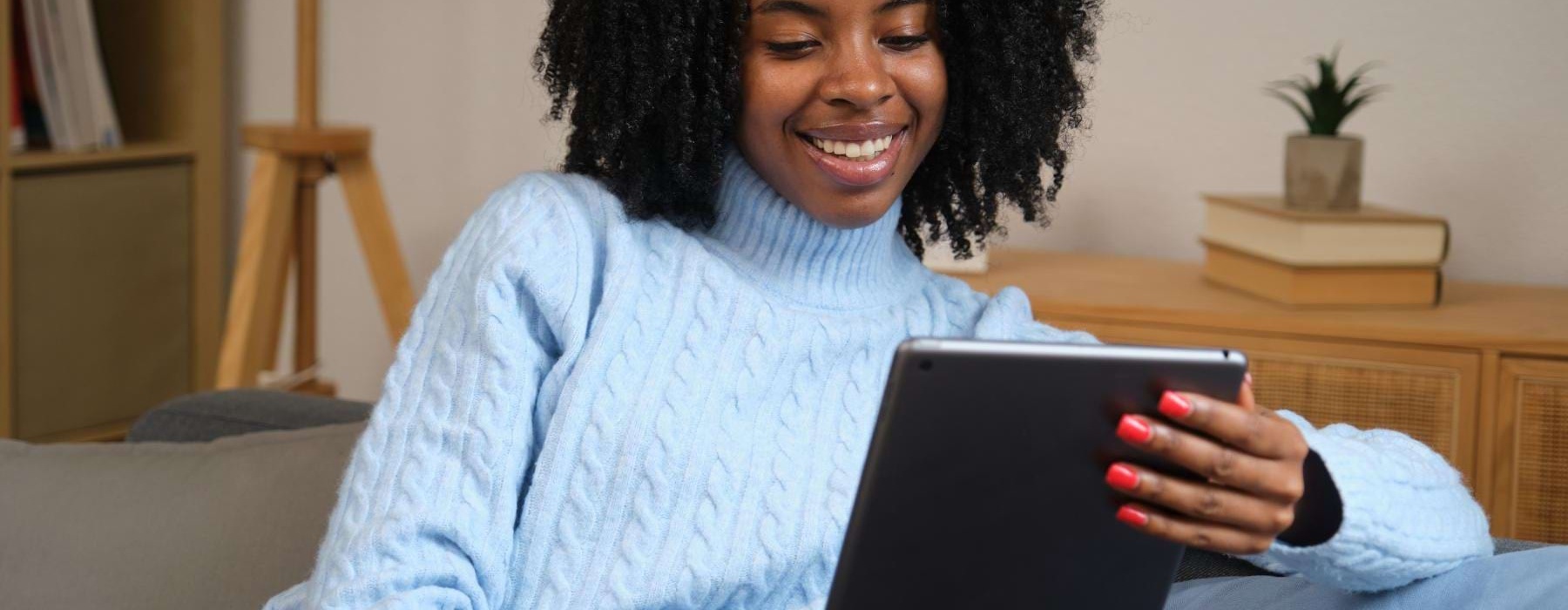 a person holding a tablet