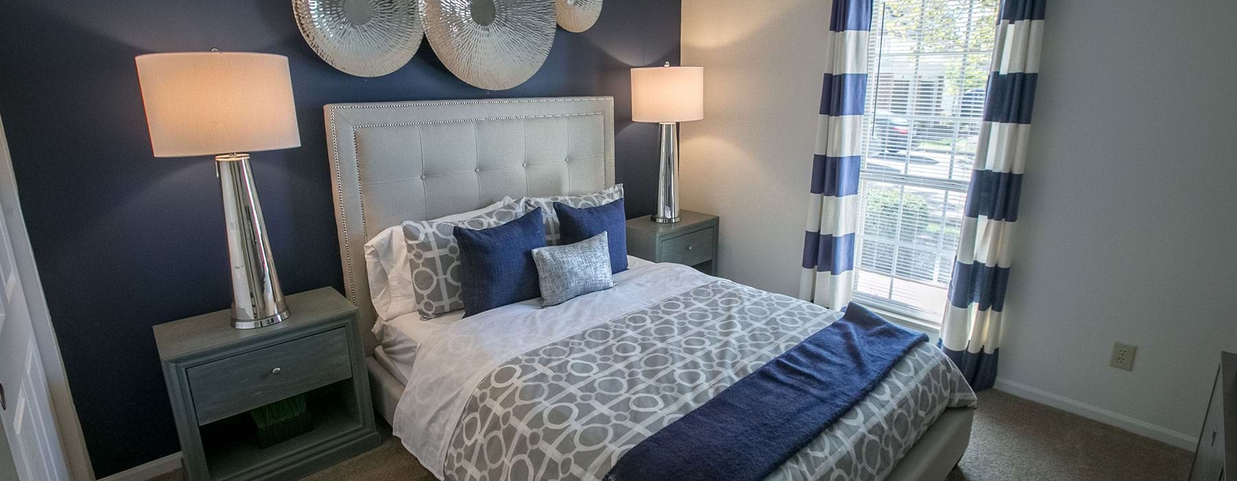 beautiful bedroom with blue wall