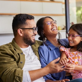 The essence of exceptional living a family sitting on a couch